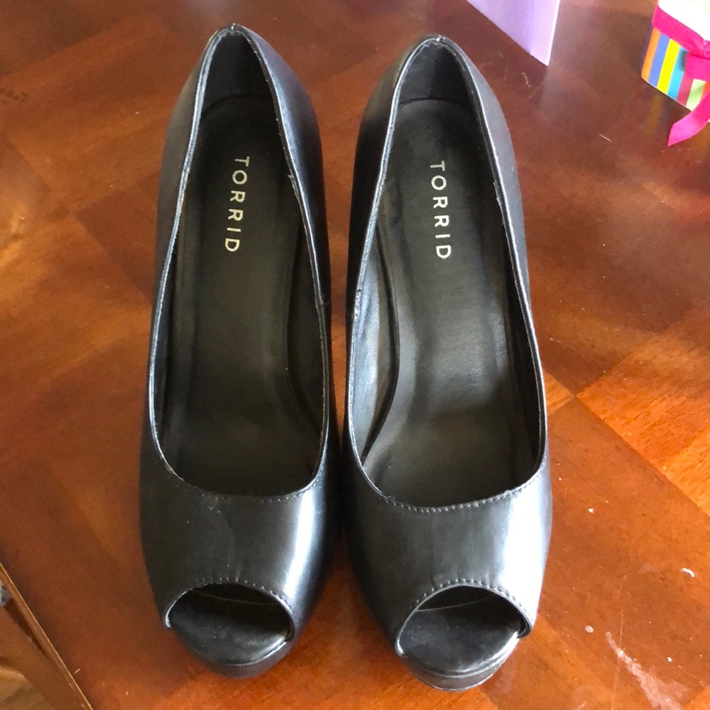 Ladies black Torrid heals, size 8. Never worn!